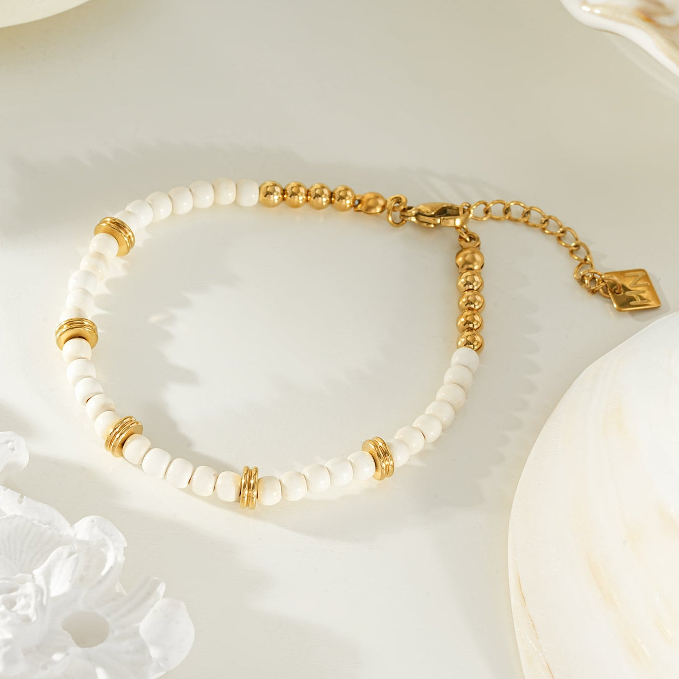 JAMILAH Gold: White Turquoise Stones and Gold Beaded Bracelet.