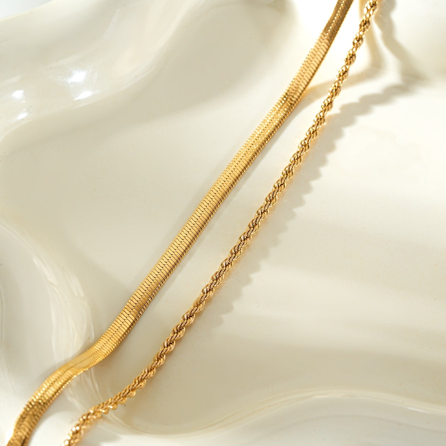 FAWZIA Gold: 2-Layered Flat Snake Chain & Rope Chain Necklace