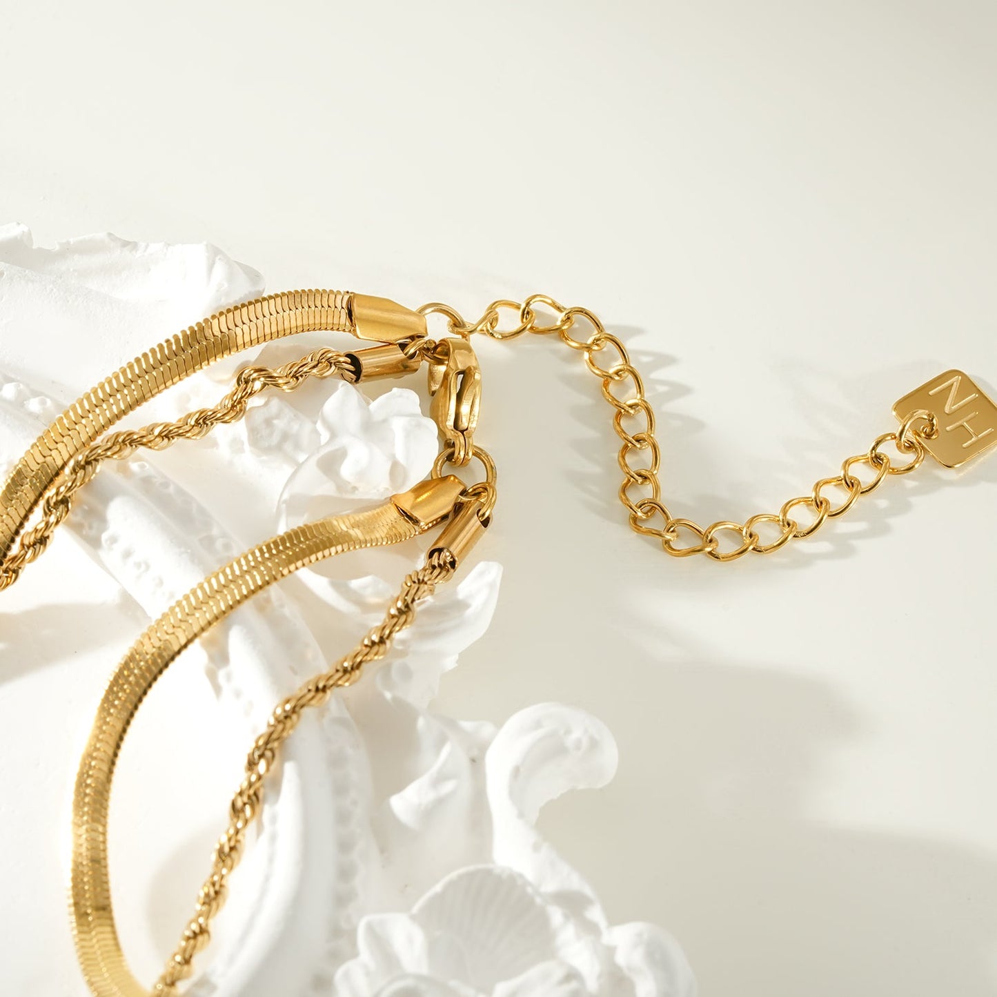 FAWZIA Gold: 2-Layered Flat Snake Chain & Rope Chain Necklace