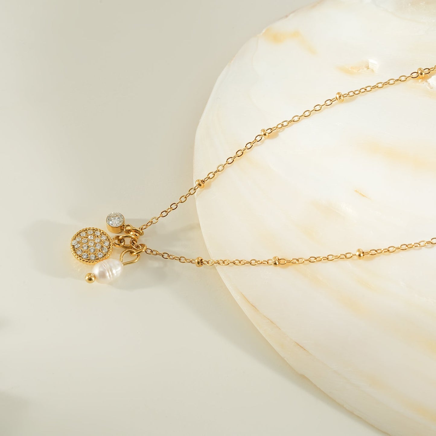 KAAMIL Gold: Retro Art Deco Charms Necklace with a Beaded Chain