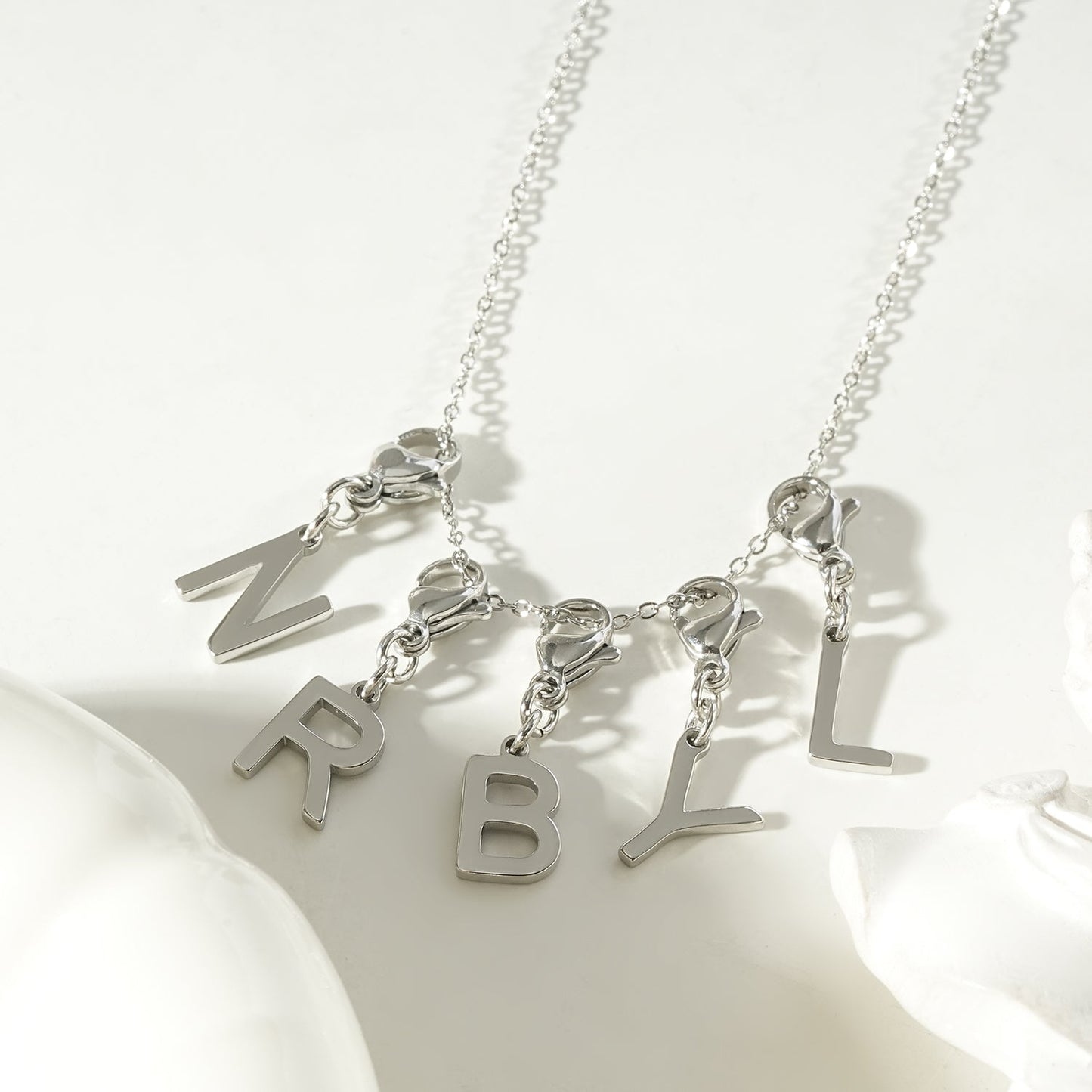 SOLID LETTER MINI CHARMS A–Z in SILVER (White Gold): Dainty Initial Alphabet Pendant for Necklaces & Bracelets — $6.75