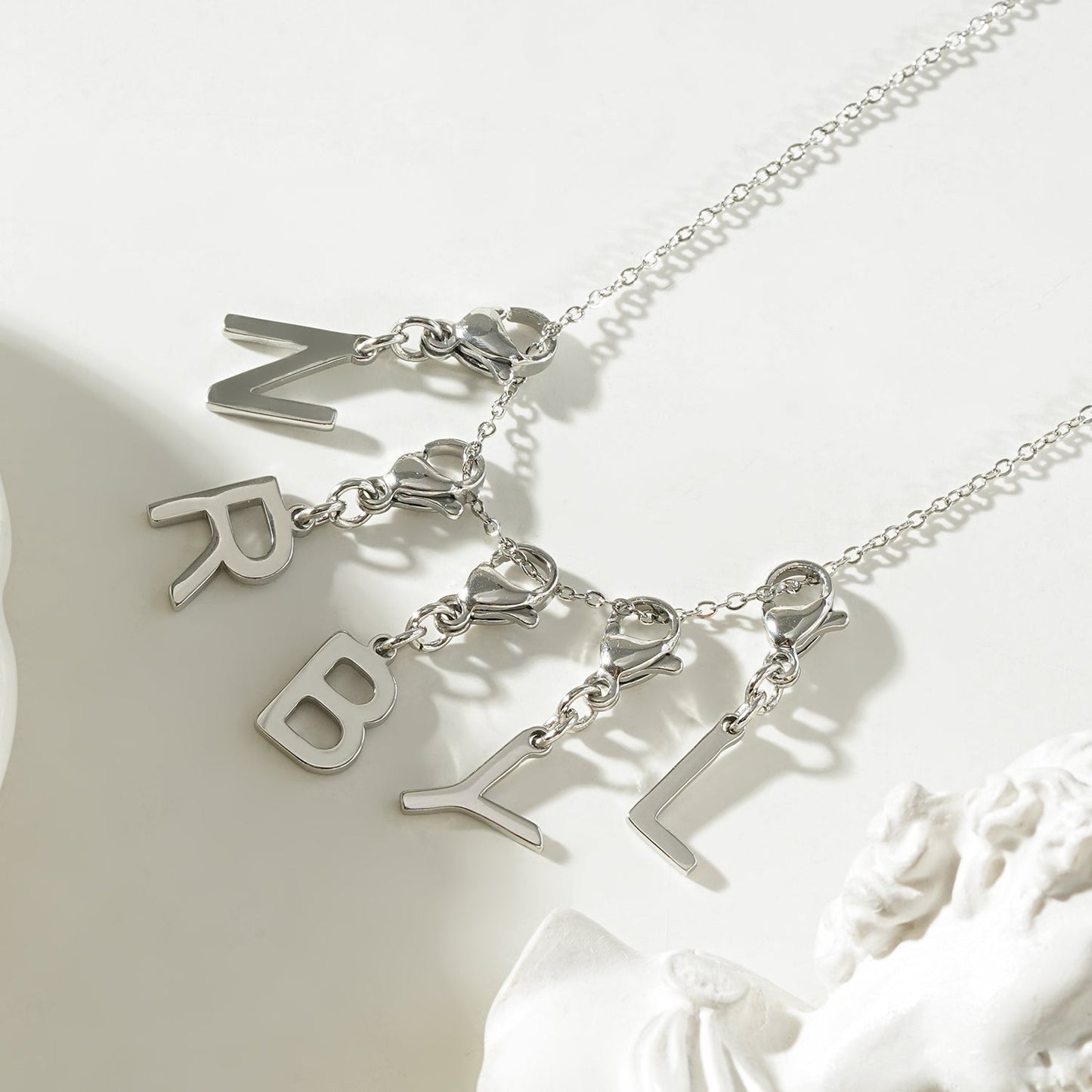 SOLID LETTER MINI CHARMS A–Z in SILVER (White Gold): Dainty Initial Alphabet Pendant for Necklaces & Bracelets — $6.75