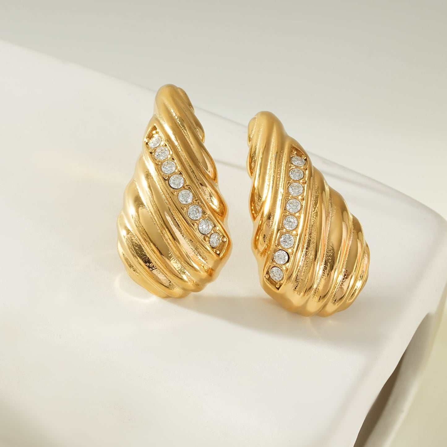 CAASHA Gold: Teardrop Statement Stud Earrings with Textured Lines & Pavé Zirconia Center