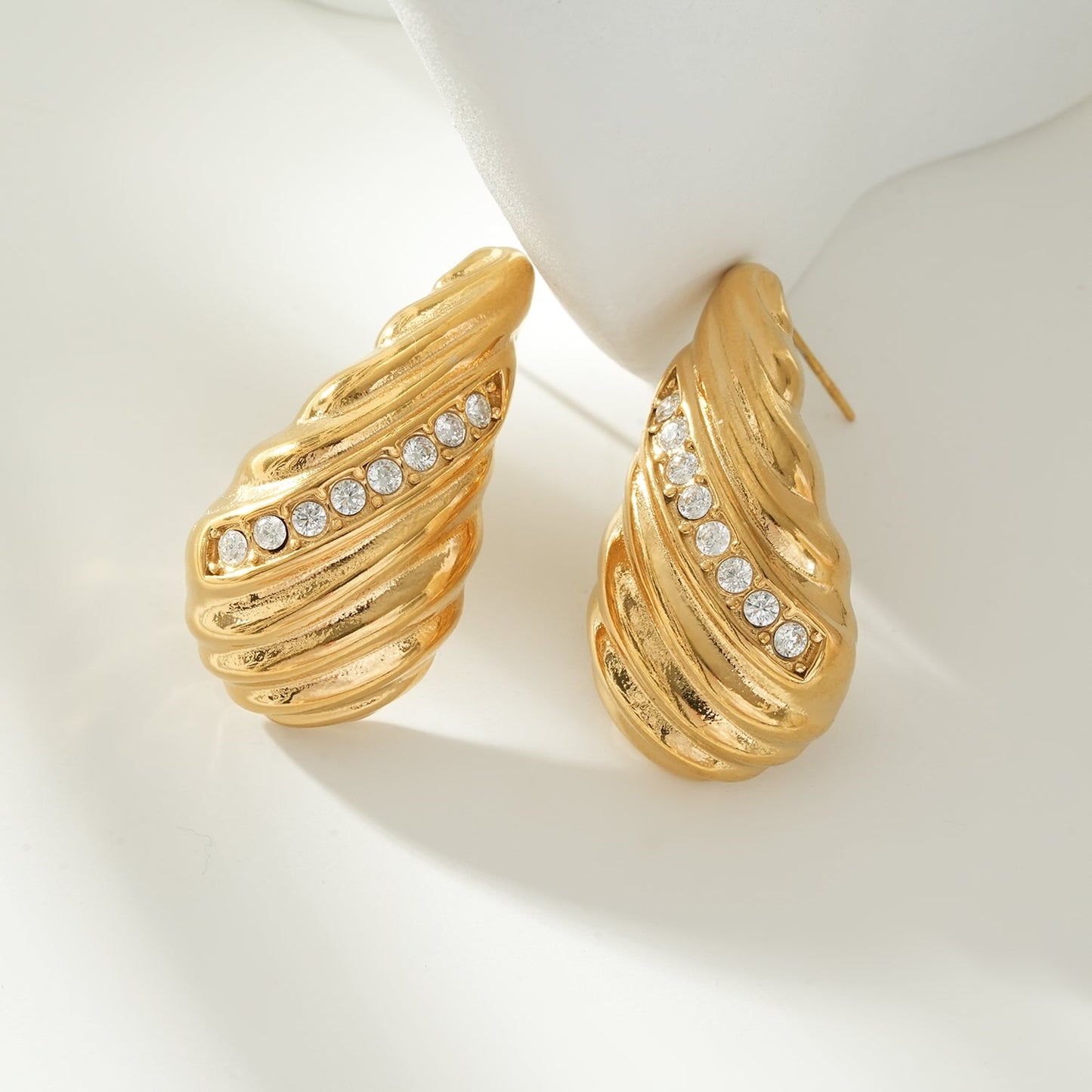 CAASHA Gold: Teardrop Statement Stud Earrings with Textured Lines & Pavé Zirconia Center