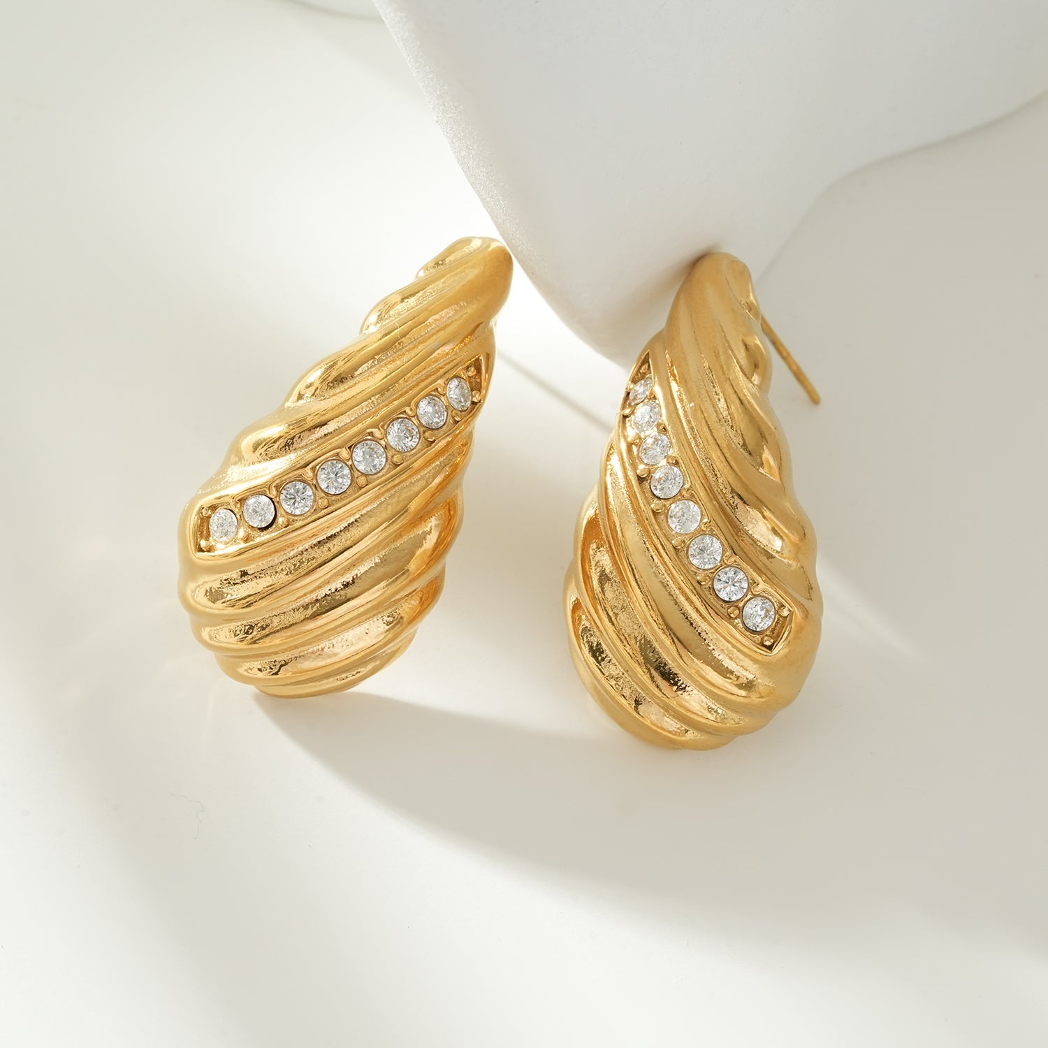 CAASHA Gold: Teardrop Statement Stud Earrings with Textured Lines & Pavé Zirconia Center