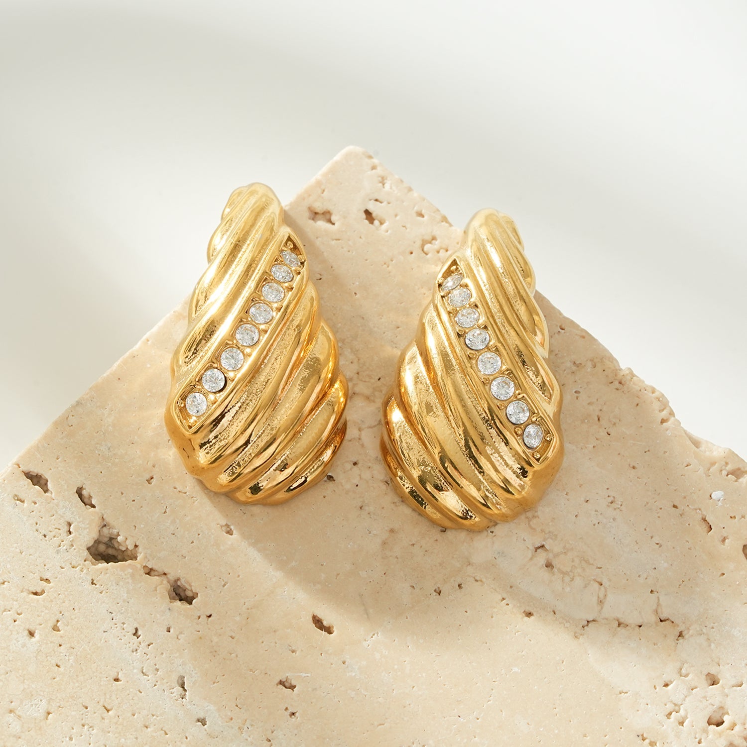 CAASHA Gold: Teardrop Statement Stud Earrings with Textured Lines & Pavé Zirconia Center
