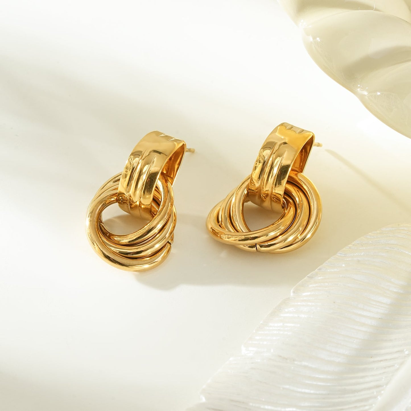 CALIGANTI Gold: Retro Style Intertwined Double Ring Earrings