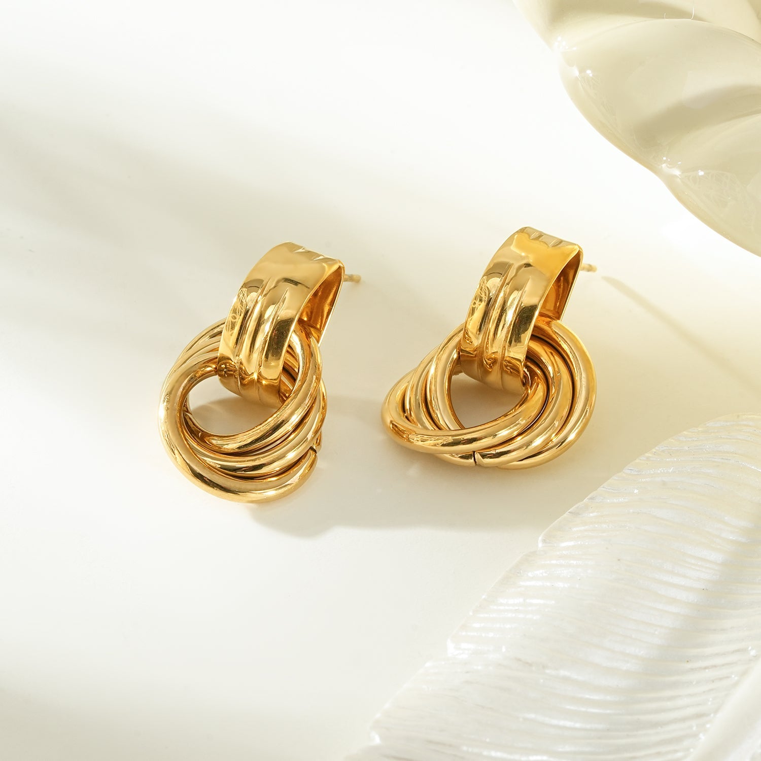 CALIGANTI Gold: Retro Style Intertwined Double Ring Earrings