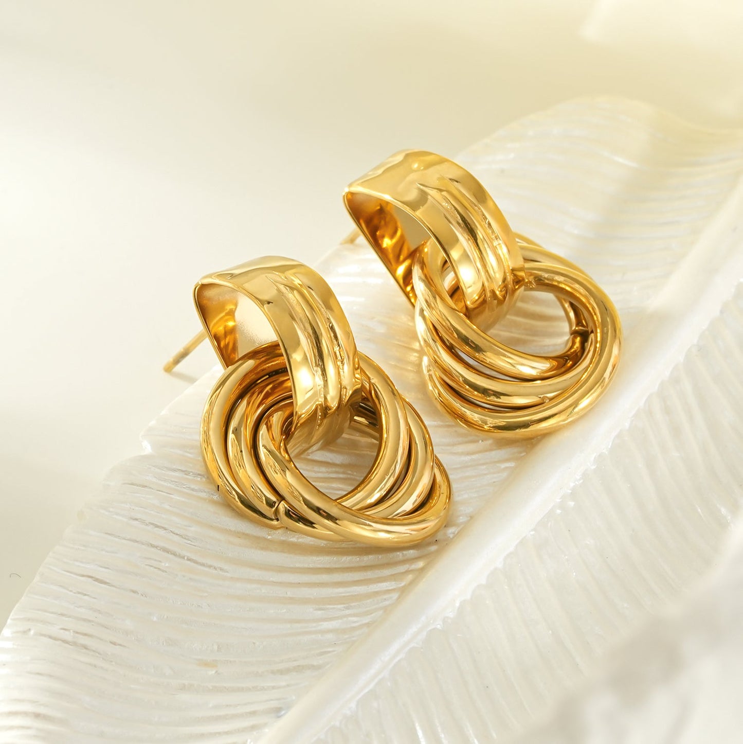 CALIGANTI Gold: Retro Style Intertwined Double Ring Earrings