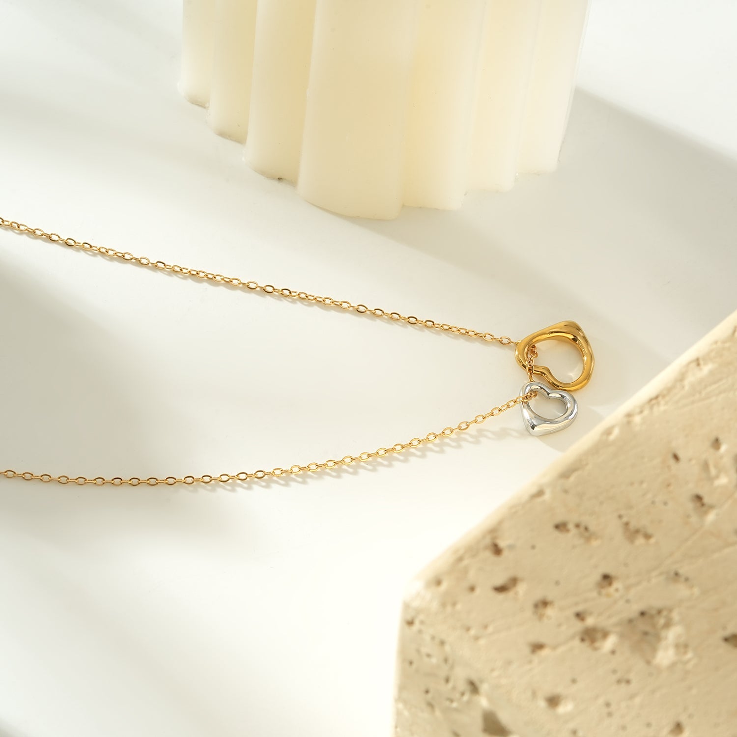 LOLANDA Gold+Silver: Dainty Gold Chain Necklace with Two Abstract Heart Charms in Gold & Silver