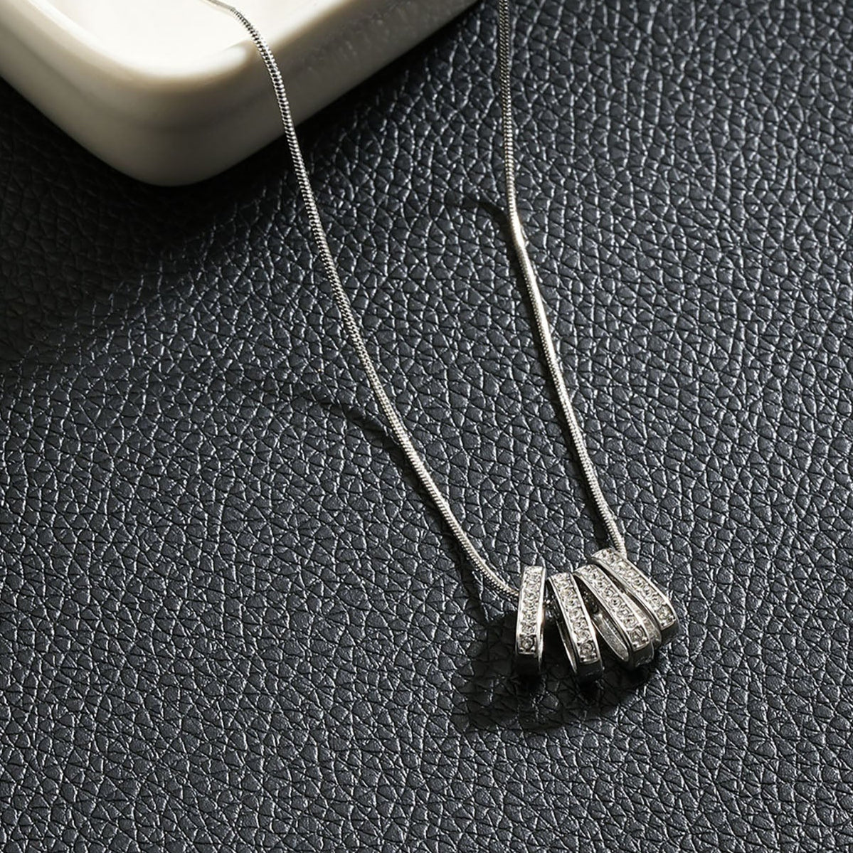 GARNA Silver (White Gold): Mini Snake-Skin Chain with Zirconia-Adorned Oval Shaped Charms