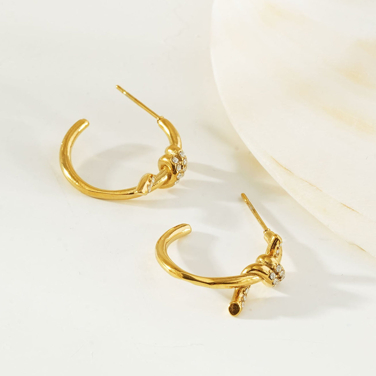 ALINA Gold: Sculptural Knotted Pavé Zirconia Earrings – Luxe Modern Style