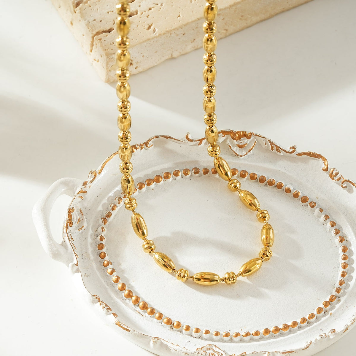 NEEMA Gold: Polished Oval Bead Necklace – Sculpted Statement Jewellery $35