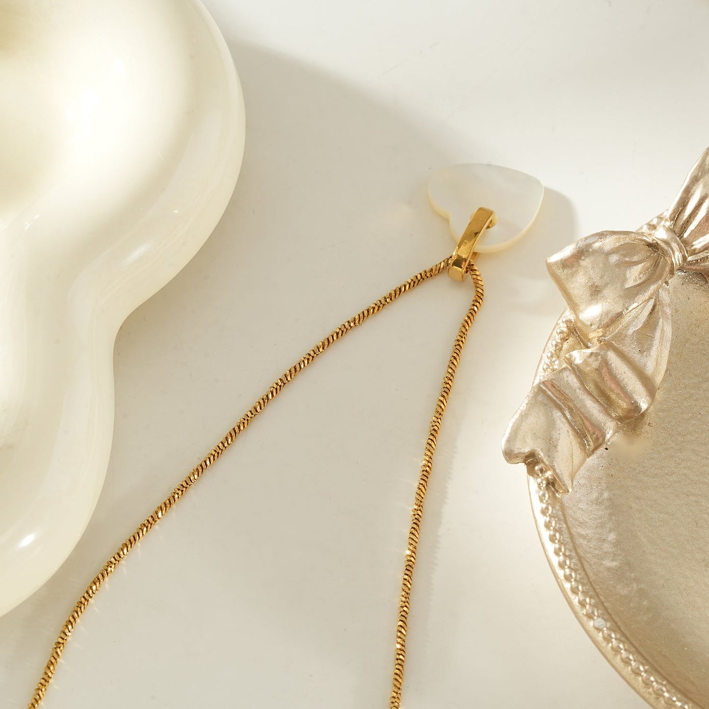 KAO Gold: Mother of Pearl Heart Pendant Necklace with Zirconia Stones