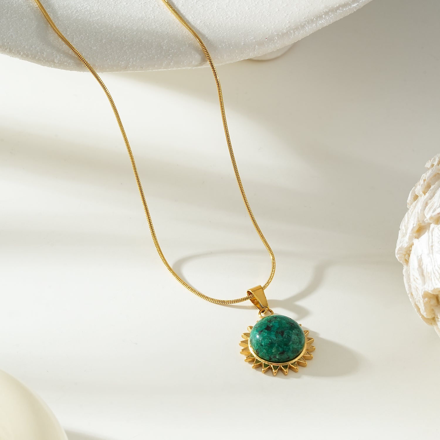 CHIDERA Gold: African Turquoise Sunburst Pendent on a Snake Skin Textured Chain Necklace