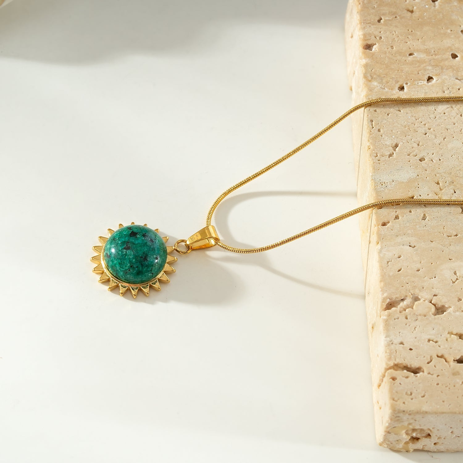 CHIDERA Gold: African Turquoise Sunburst Pendent on a Snake Skin Textured Chain Necklace