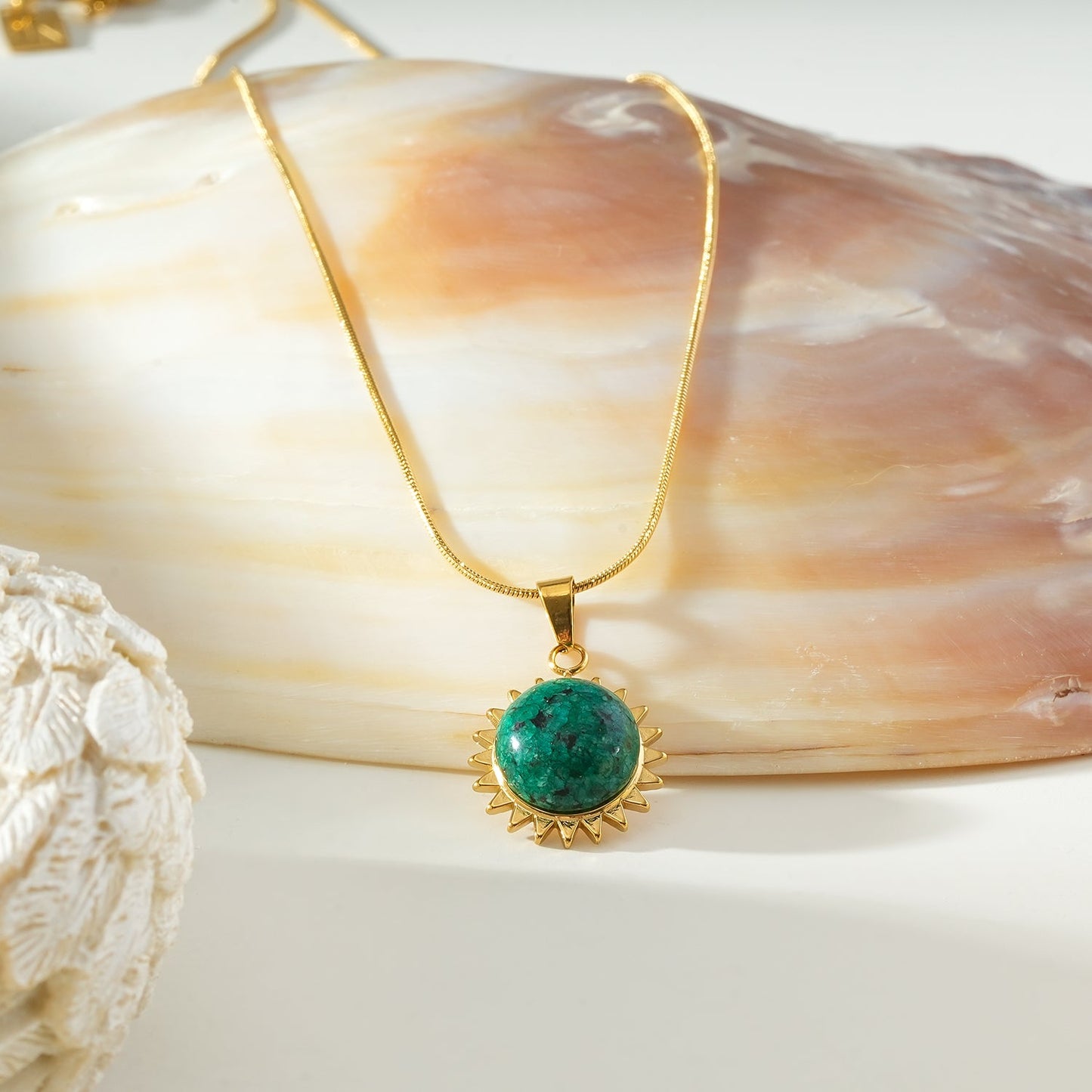 CHIDERA Gold: African Turquoise Sunburst Pendent on a Snake Skin Textured Chain Necklace
