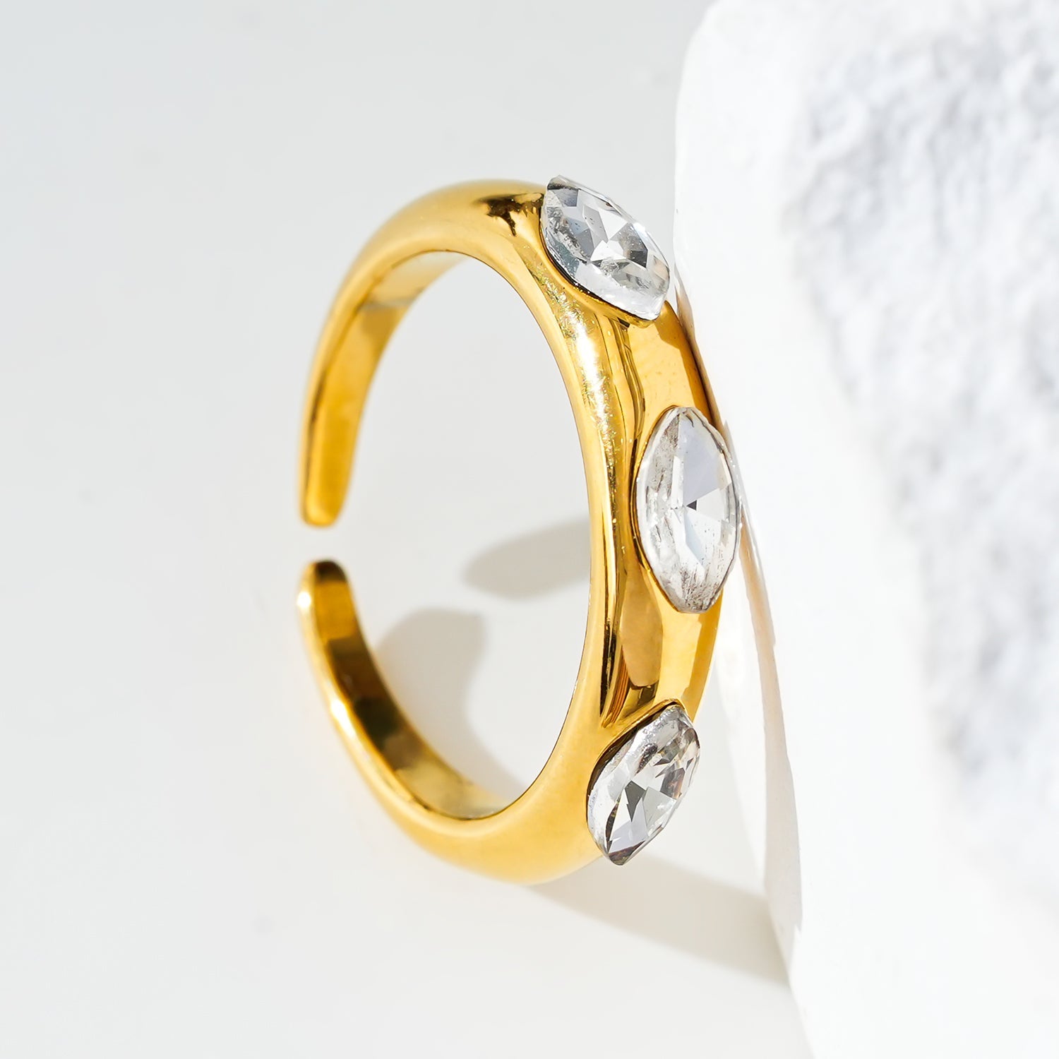 Style ELENITA: Modernist Inspired Band Ring with Triple Zirconia Gemstones