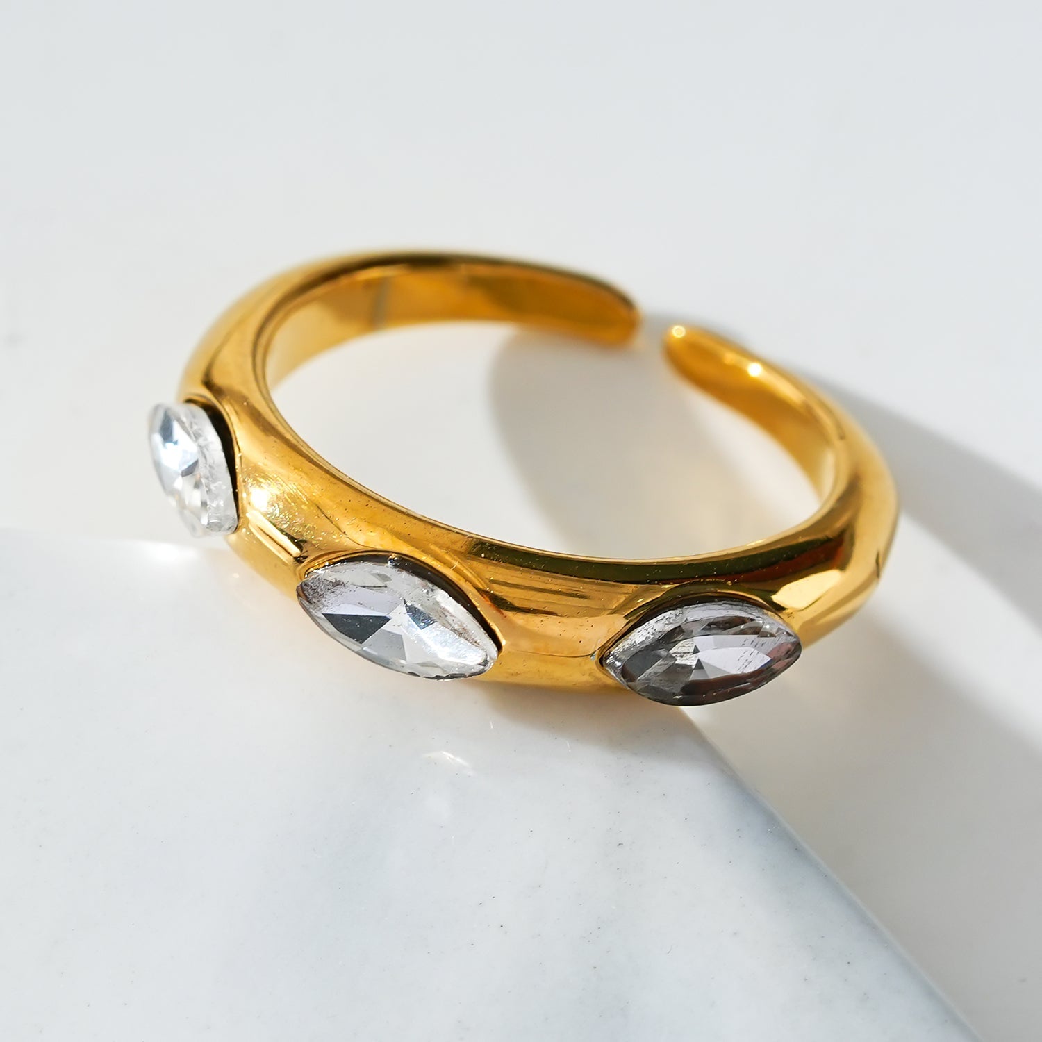 Style ELENITA: Modernist Inspired Band Ring with Triple Zirconia Gemstones