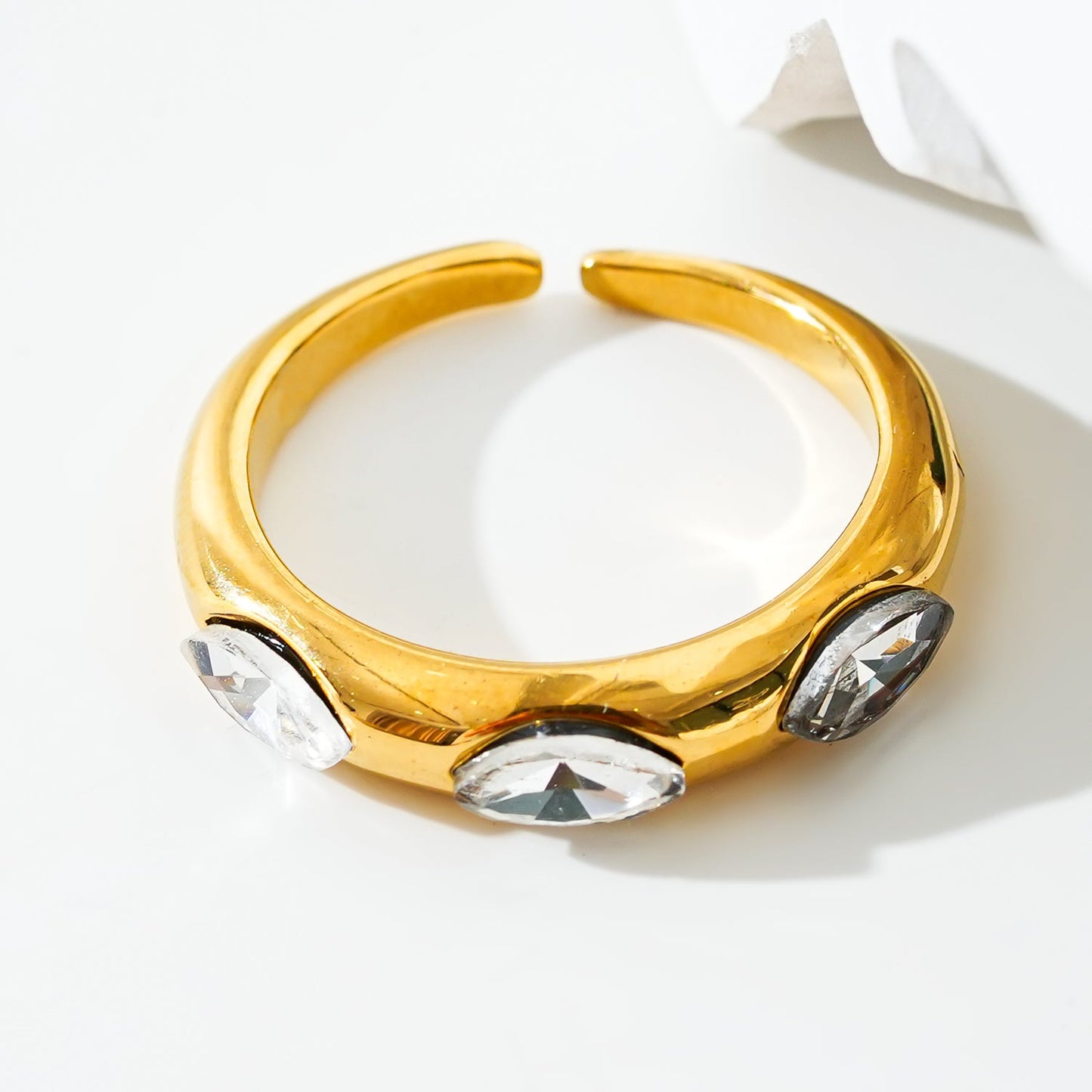 Style ELENITA: Modernist Inspired Band Ring with Triple Zirconia Gemstones