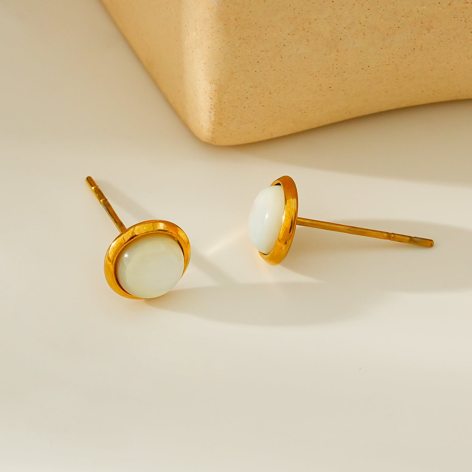 ENFIELD: Gold Rimmed Natural Shell Round Stud Earrings