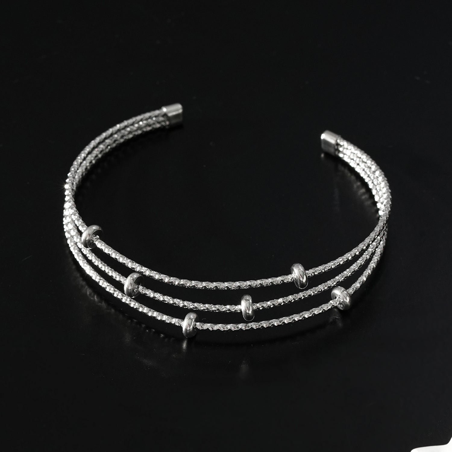 Style FARZIKA Silver: Triple Stacked Textured Beaded Bracelet