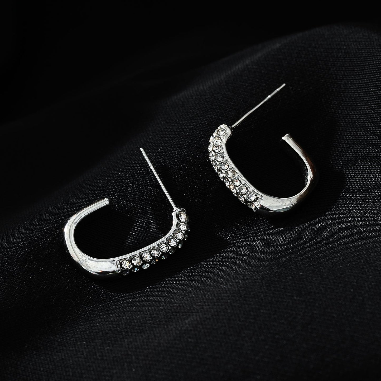 Style FIRLE Silver (White Gold): Partial Pavé Zirconia Oval Hoop Earrings