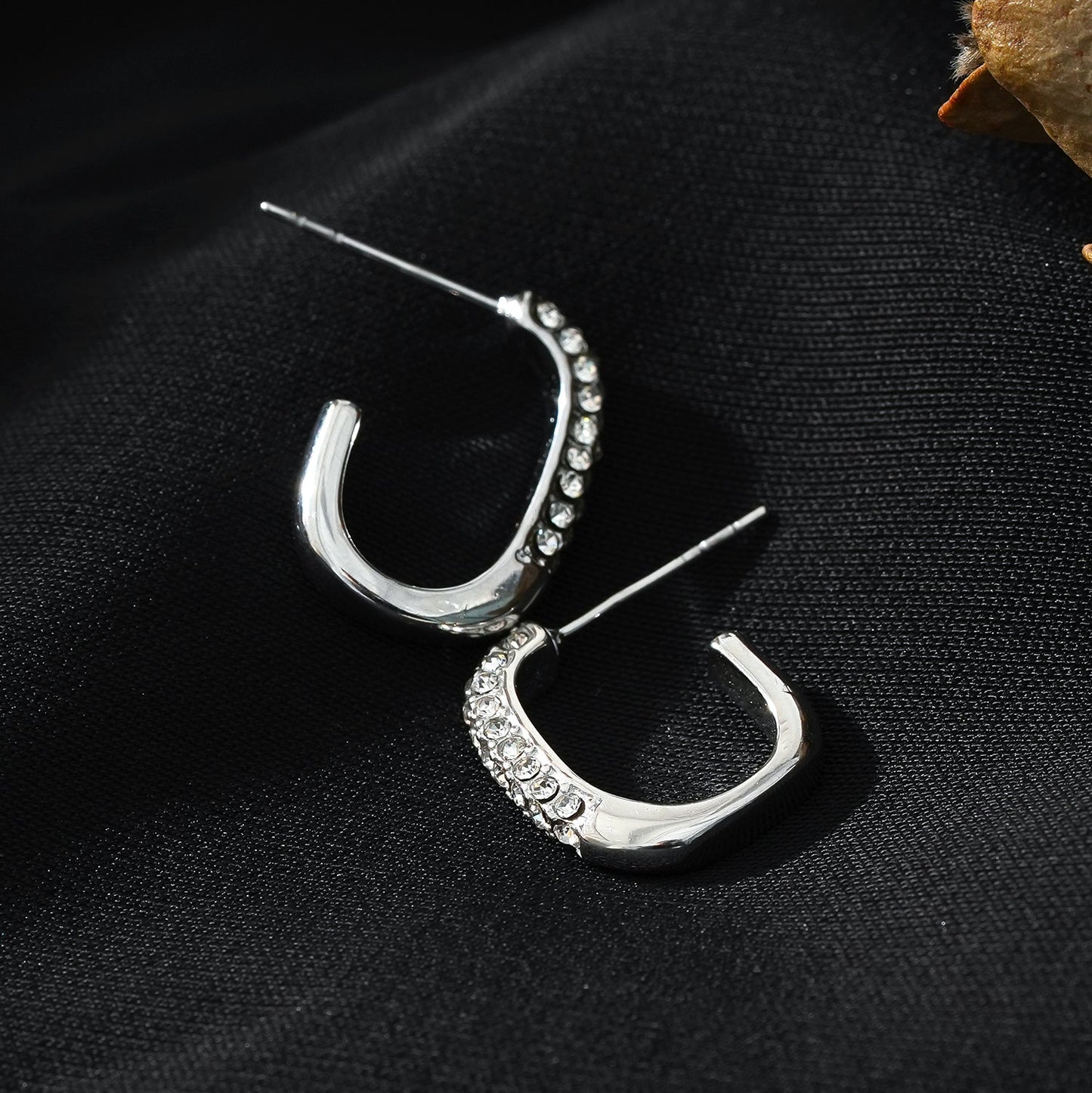 Style FIRLE Silver (White Gold): Partial Pavé Zirconia Oval Hoop Earrings