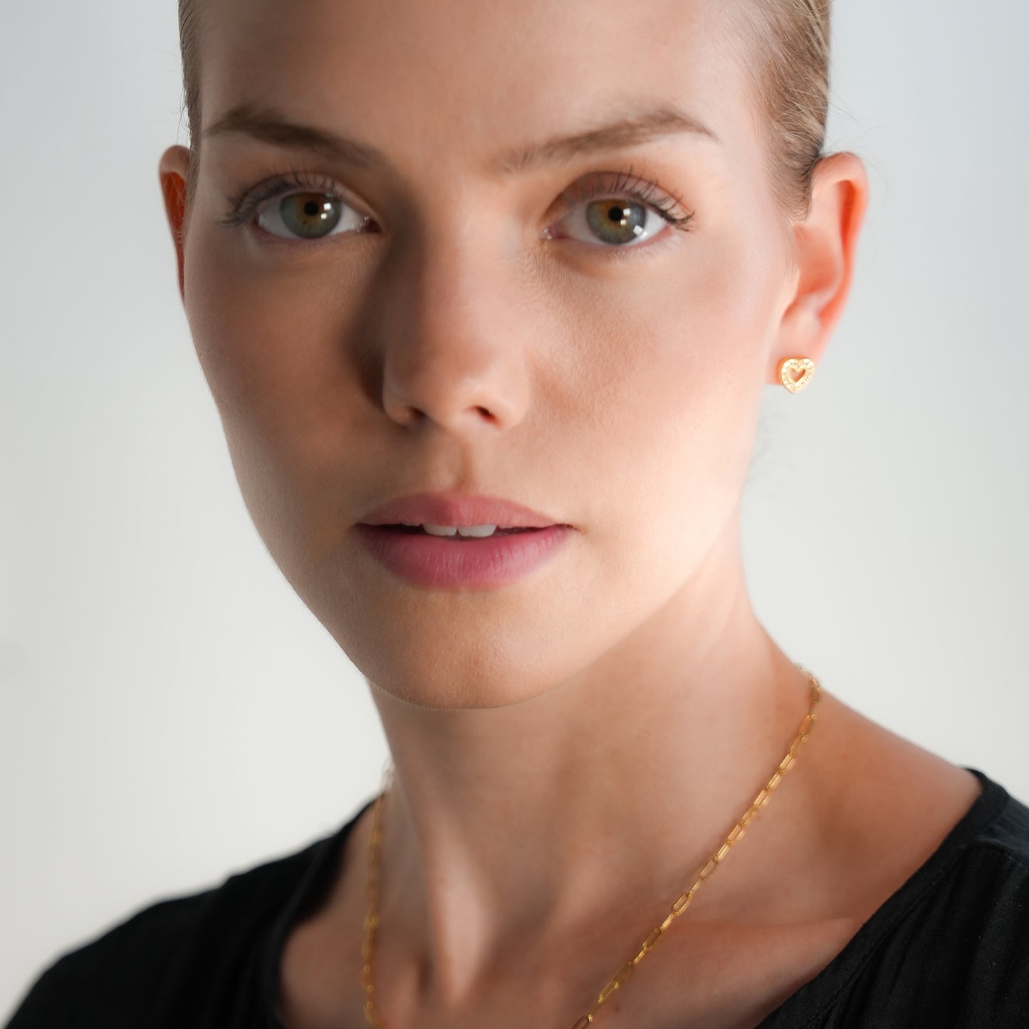 FOREVER Gold: Dazzling Heart Shaped Zirconia (CZ) Embedded Stud Earrings