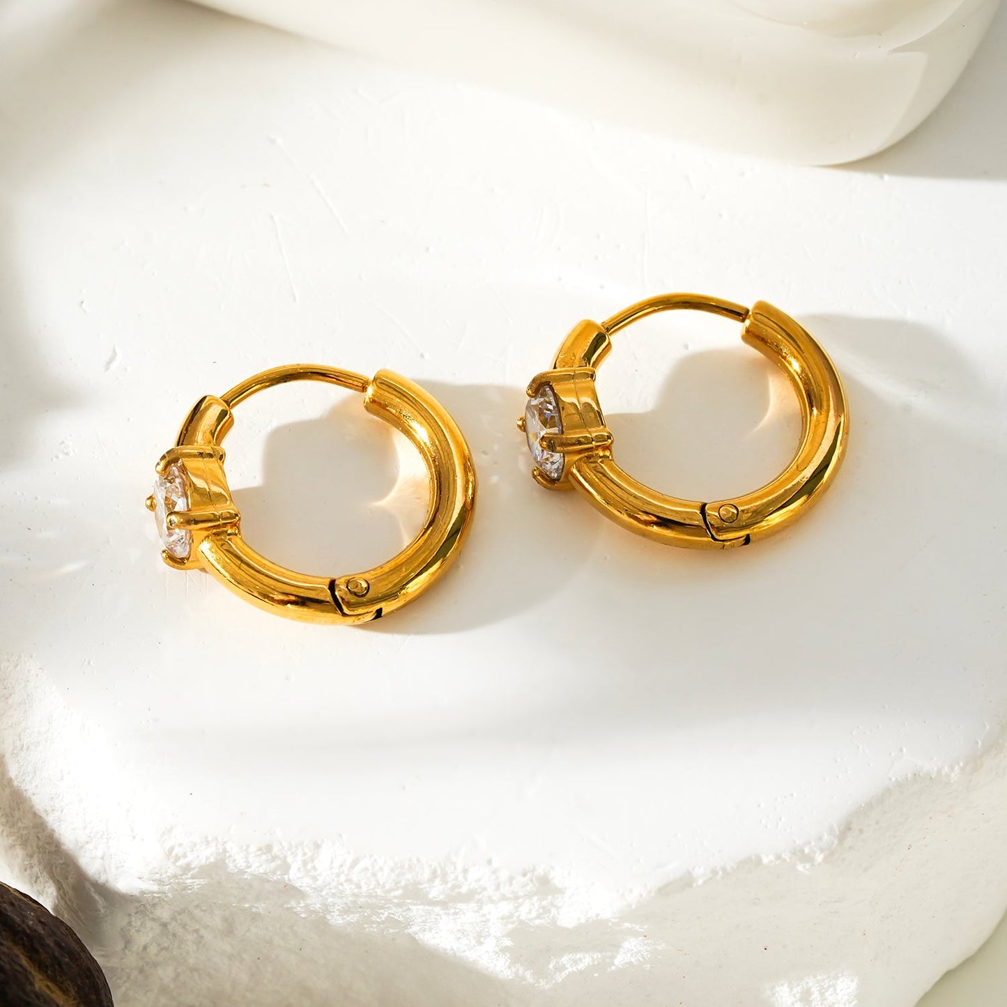GALENA Gold: Mini Hoop Gold Earrings with a Rounded Moissanite Stone