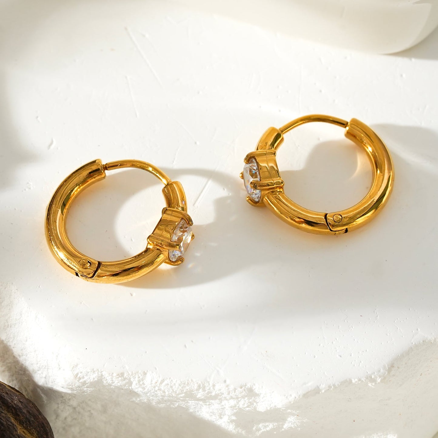 GALENA Gold: Mini Hoop Gold Earrings with a Rounded Moissanite Stone