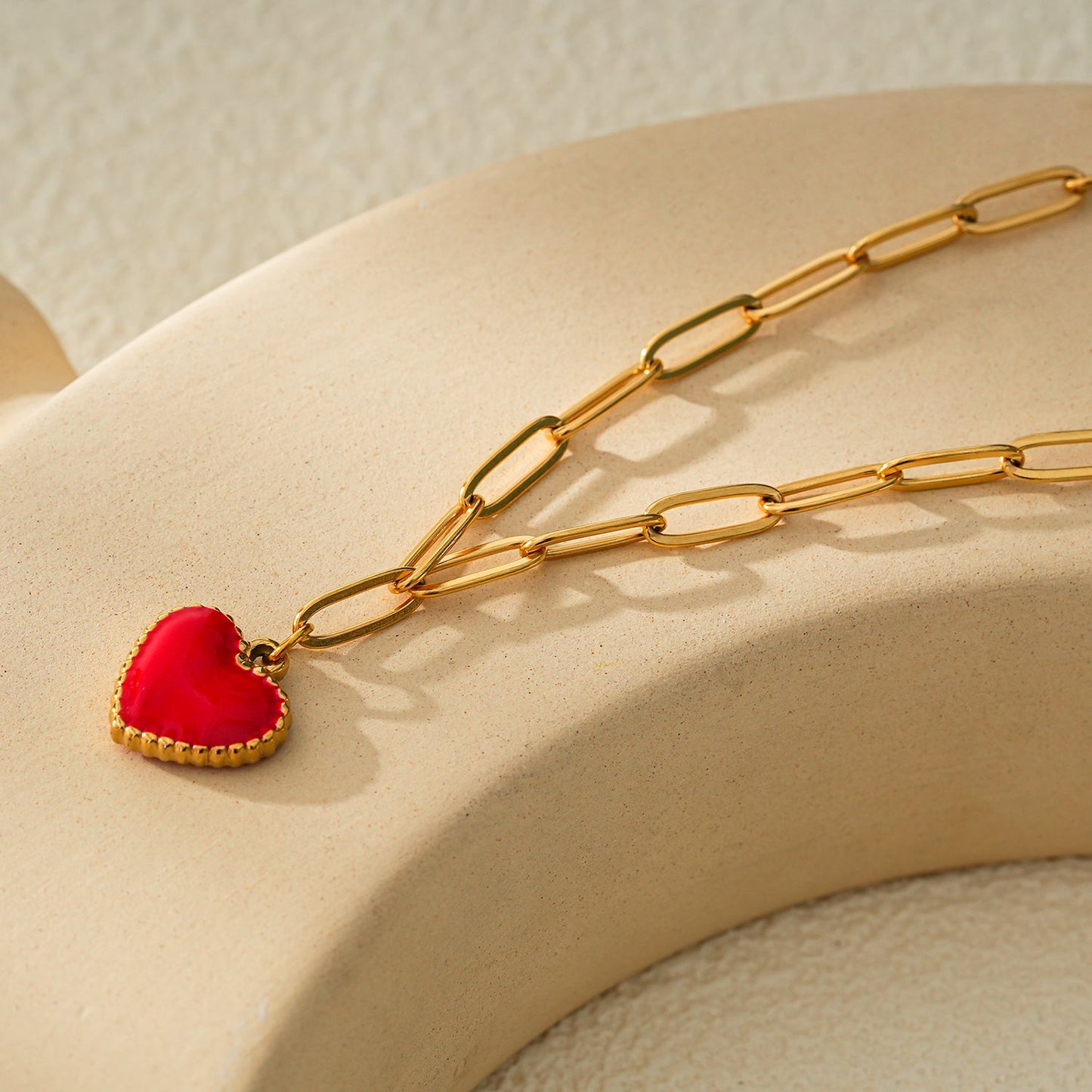 HEART ROUGE Gold: Paper Clip Chain Anchoring an Enameled Red Heart Charm