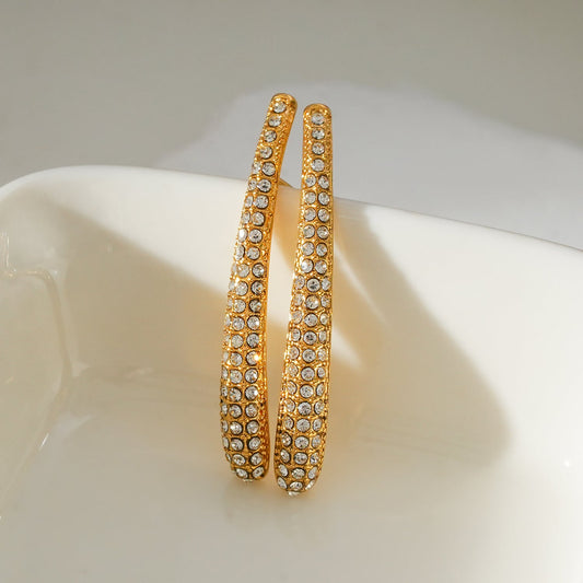 Style HILO: Curved Pavé Zirconia Shaped Stud Earrings Gold