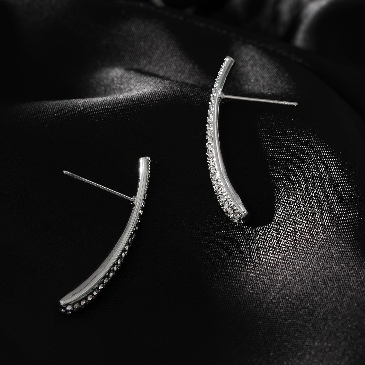 Style HILO: Curved Pavé Zirconia Shaped Stud Earrings in Silver