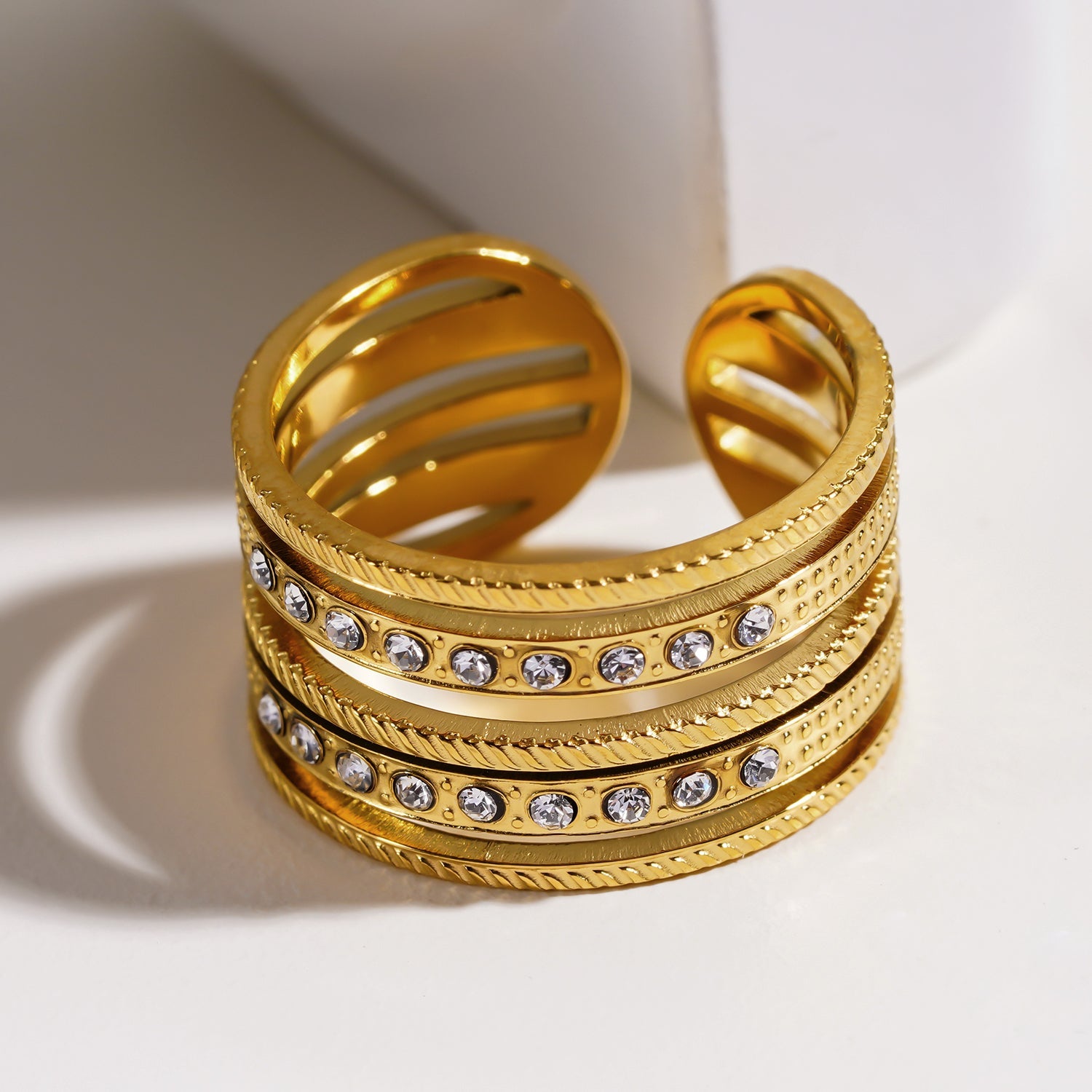 Style ISADORA: Multi Stacked Zirconia Embedded Textured Ring.