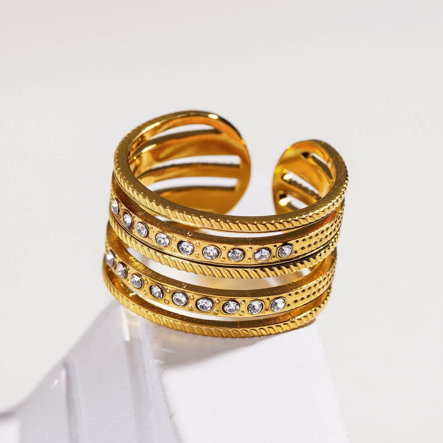 Style ISADORA: Multi Stacked Zirconia Embedded Textured Ring.