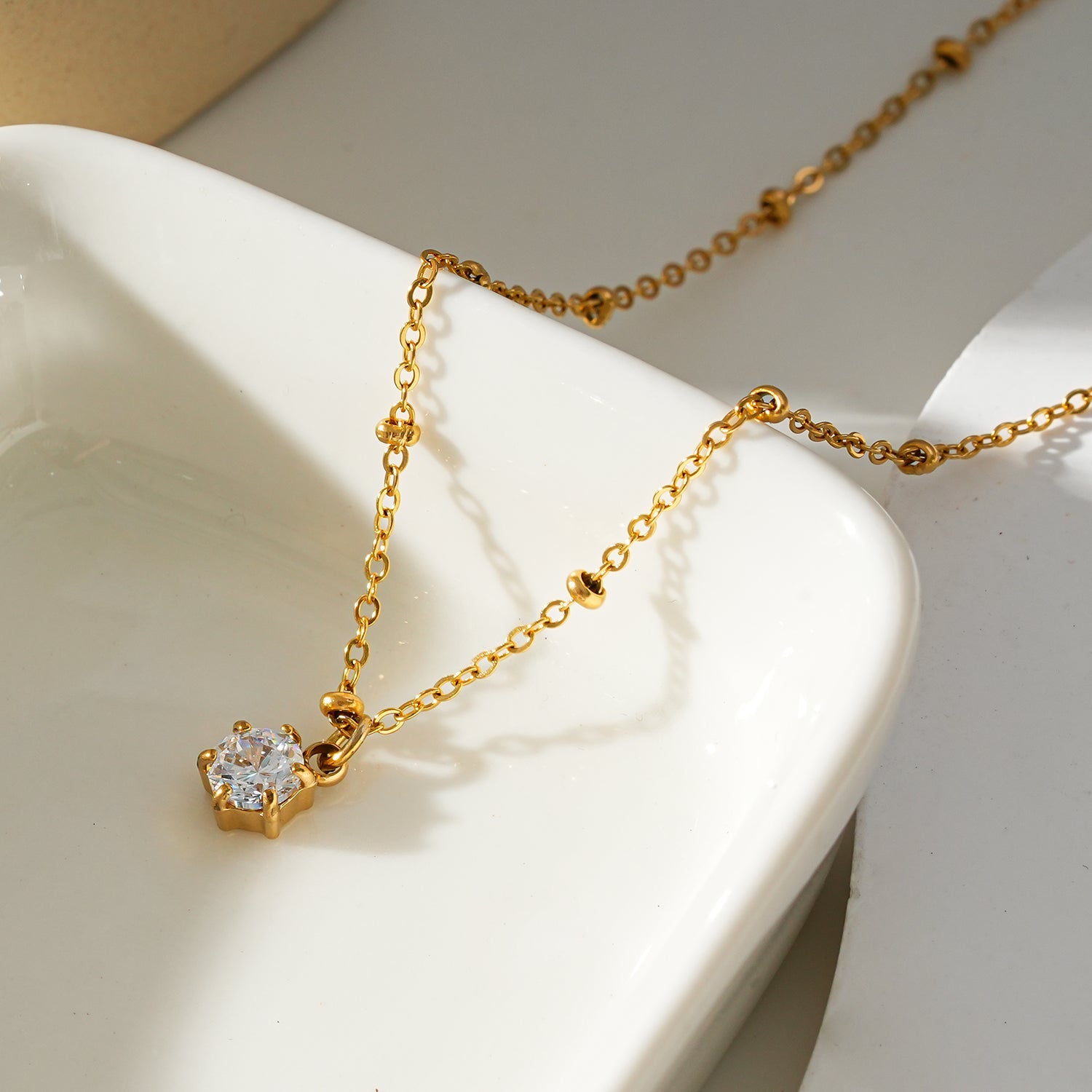 Style KADIRI Gold:  Solitaire Zirconia Charm Pendant on a Beaded Chain Necklace