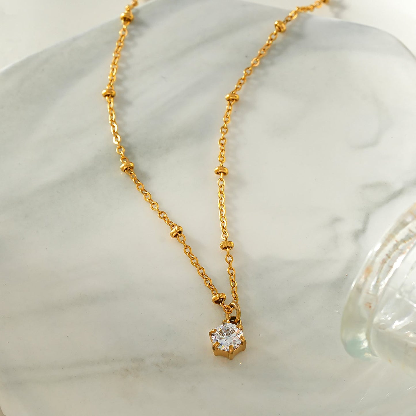 Style KADIRI Gold:  Solitaire Zirconia Charm Pendant on a Beaded Chain Necklace