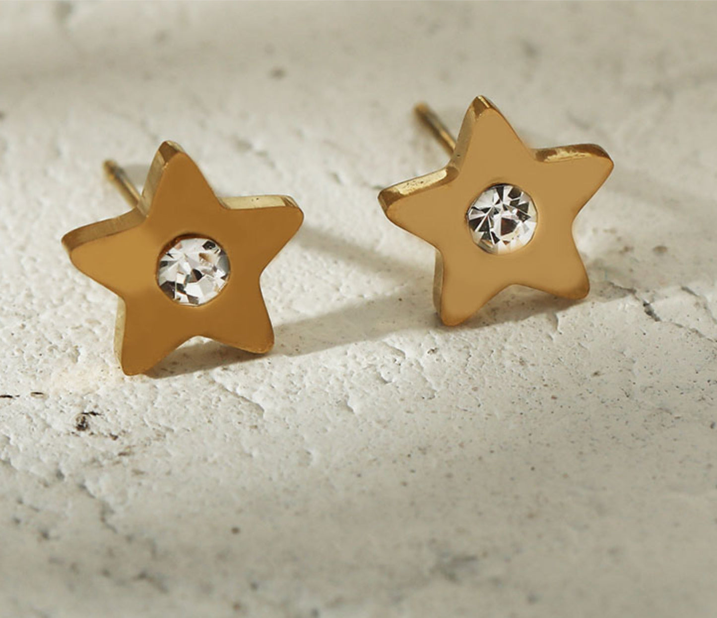 LAYLA Gold: Star Shaped Stud Earrings with a Solitaire Zirconia at Centre