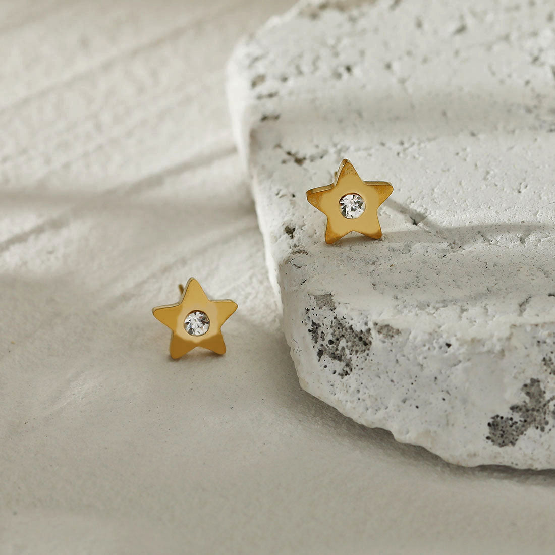 LAYLA Gold: Star Shaped Stud Earrings with a Solitaire Zirconia at Centre