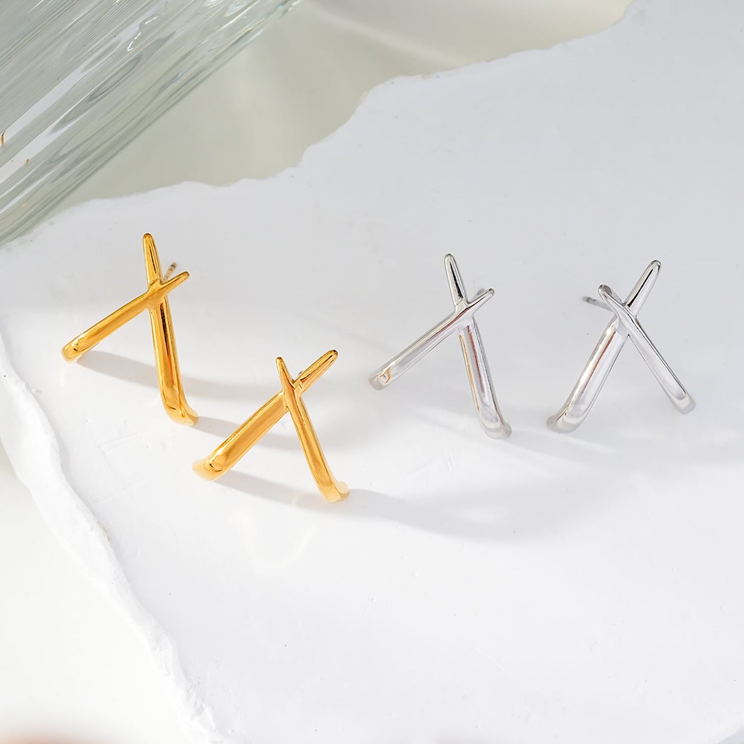 LINDSBORG: Criss-Cross Geometric Stud Earrings in Gold & White Gold