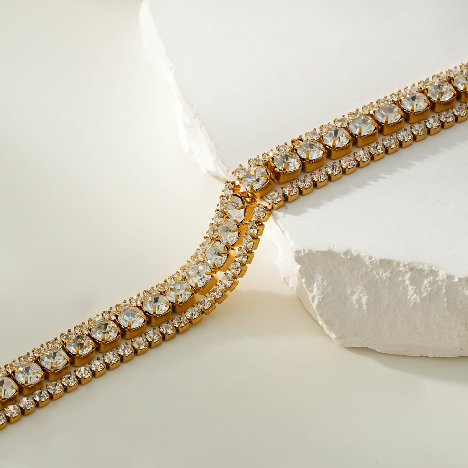 NANDAMA Gold: Pre-Layered & Stacked for Glamour - Three-Row Zirconia (CZ) Tennis Bracelet with Bold Centerpiece