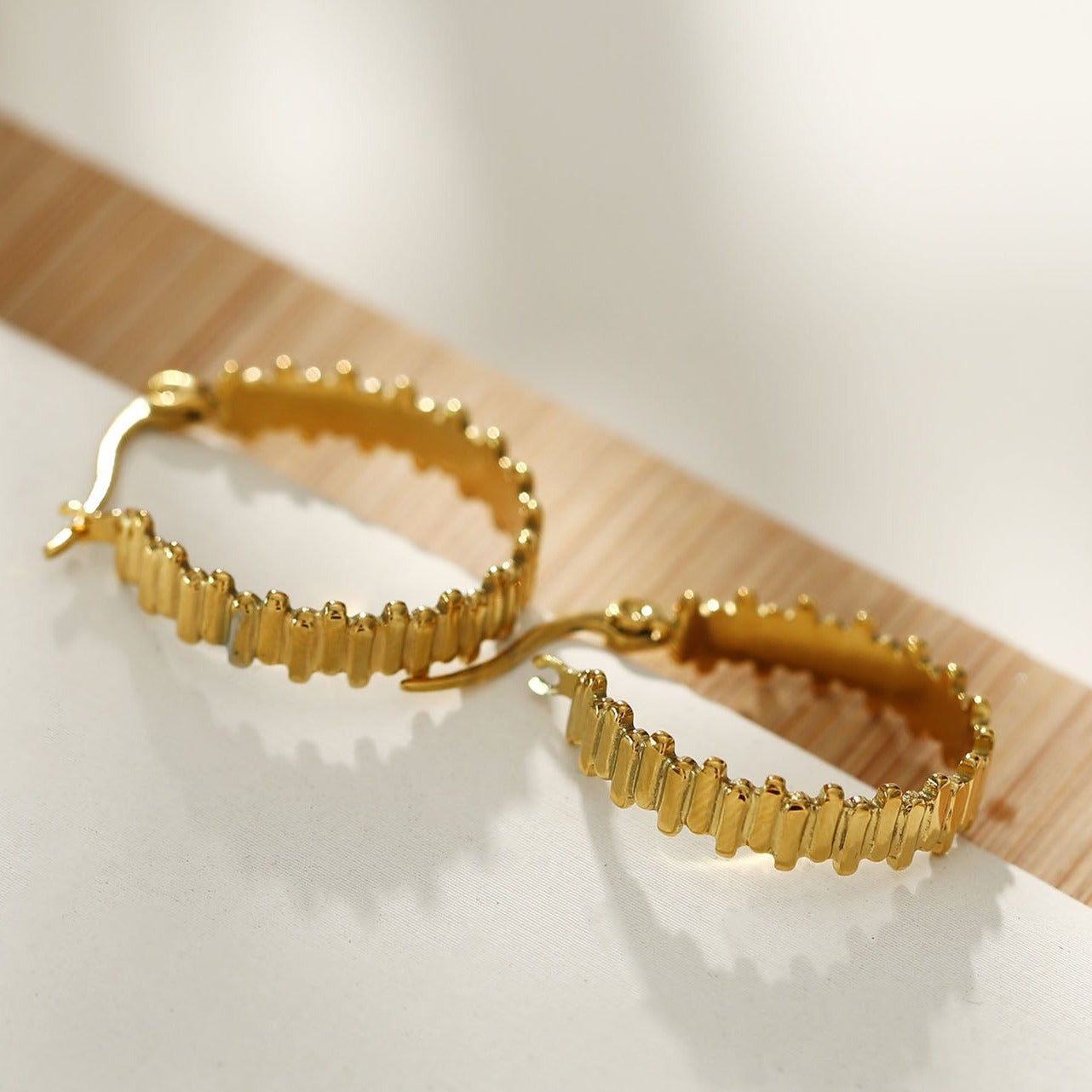 KANA Uneven Laddered Hoop Earrings