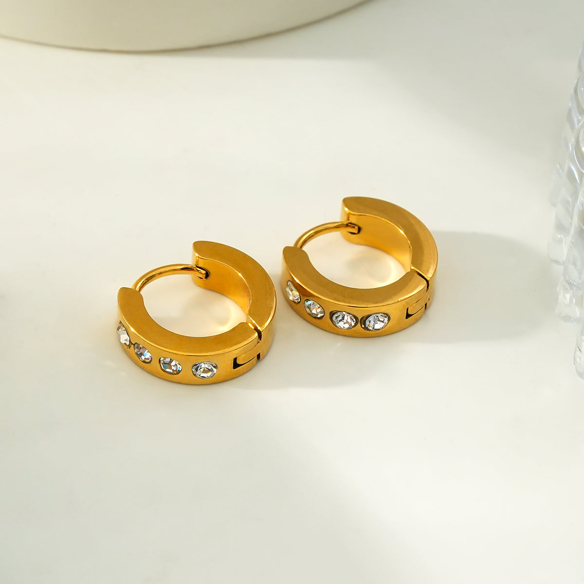 PAIA Gold: Wide Mini Hoop Gold Earrings with an Array of Zirconia (CZ) Gemstones