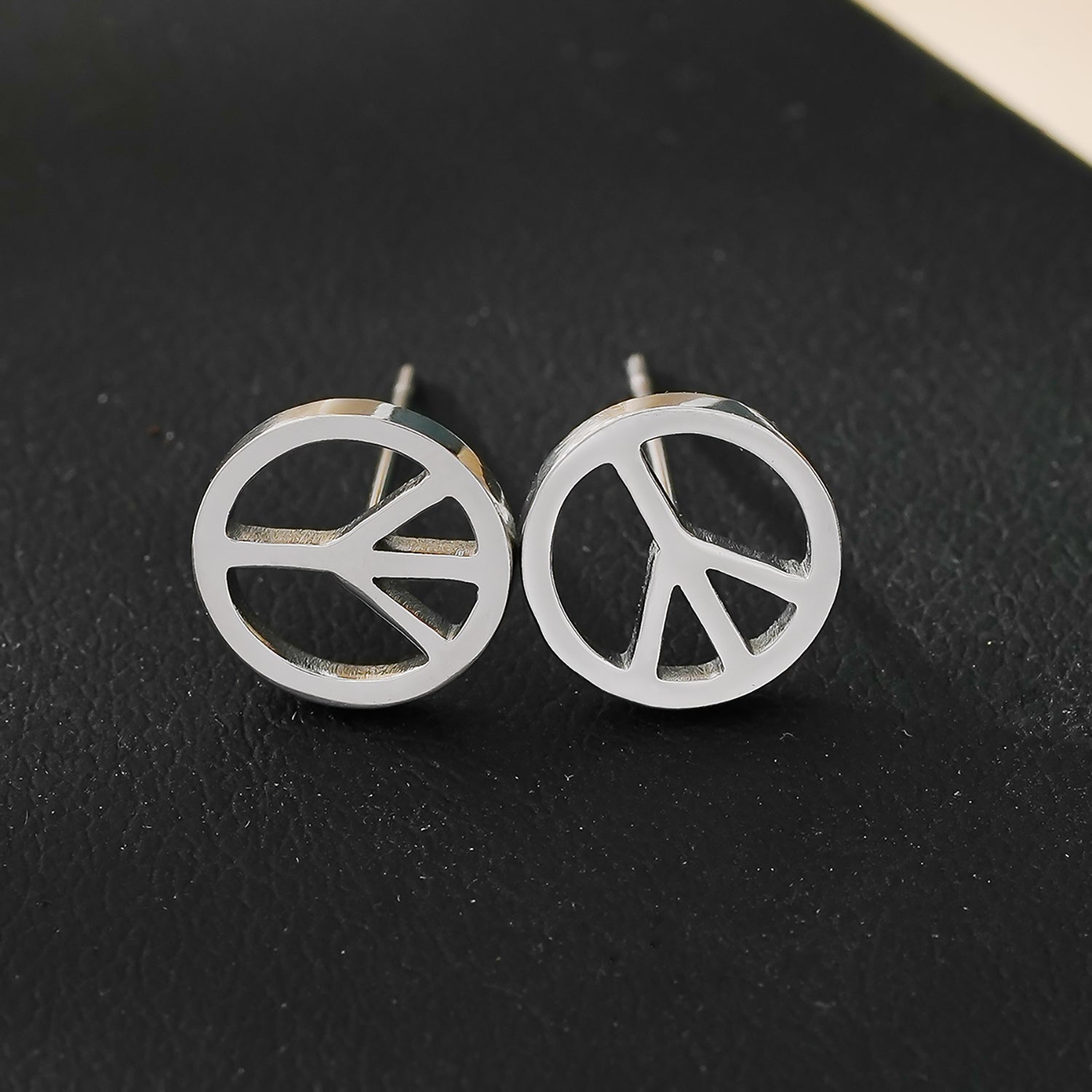 PEACE Logo Stud Earrings in Silver Tone (White Gold)