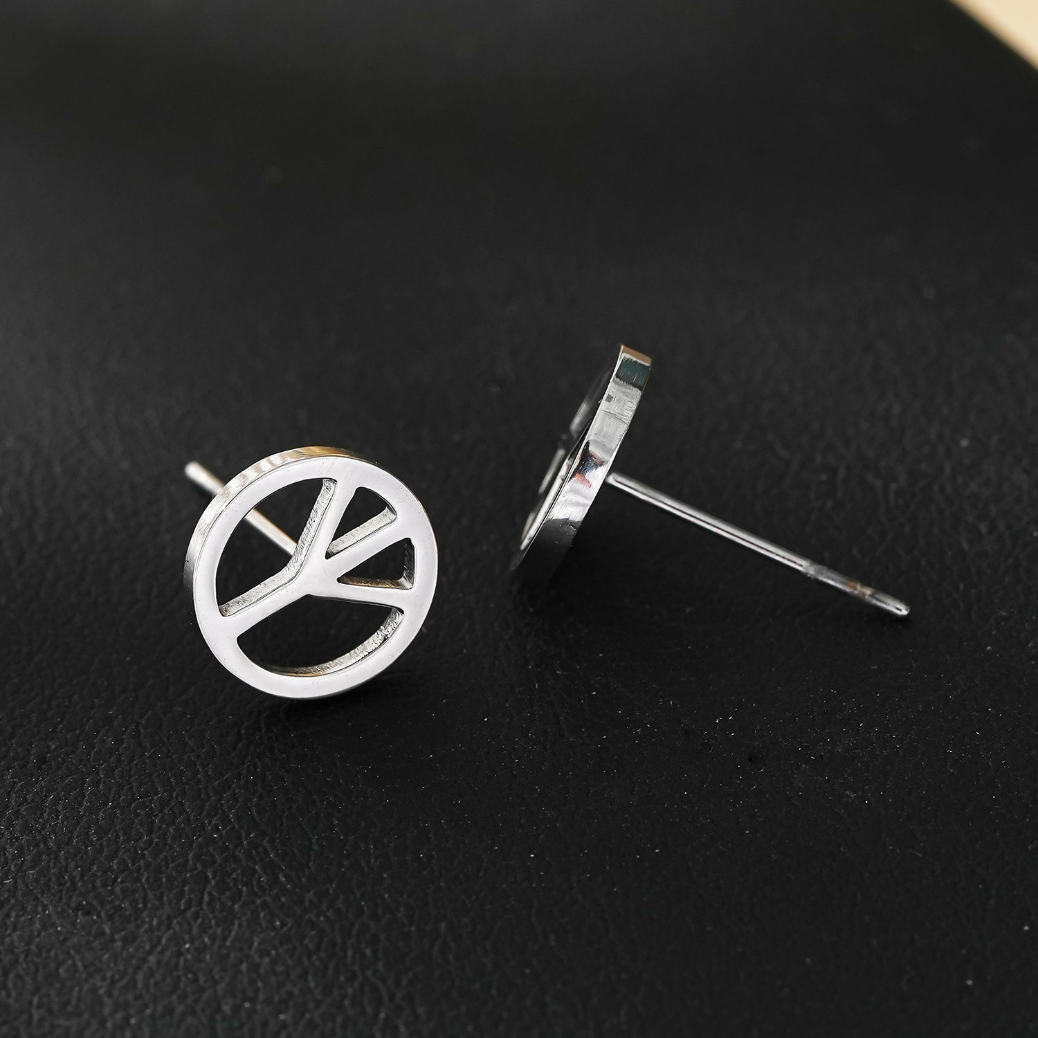 PEACE Logo Stud Earrings in Silver Tone (White Gold)