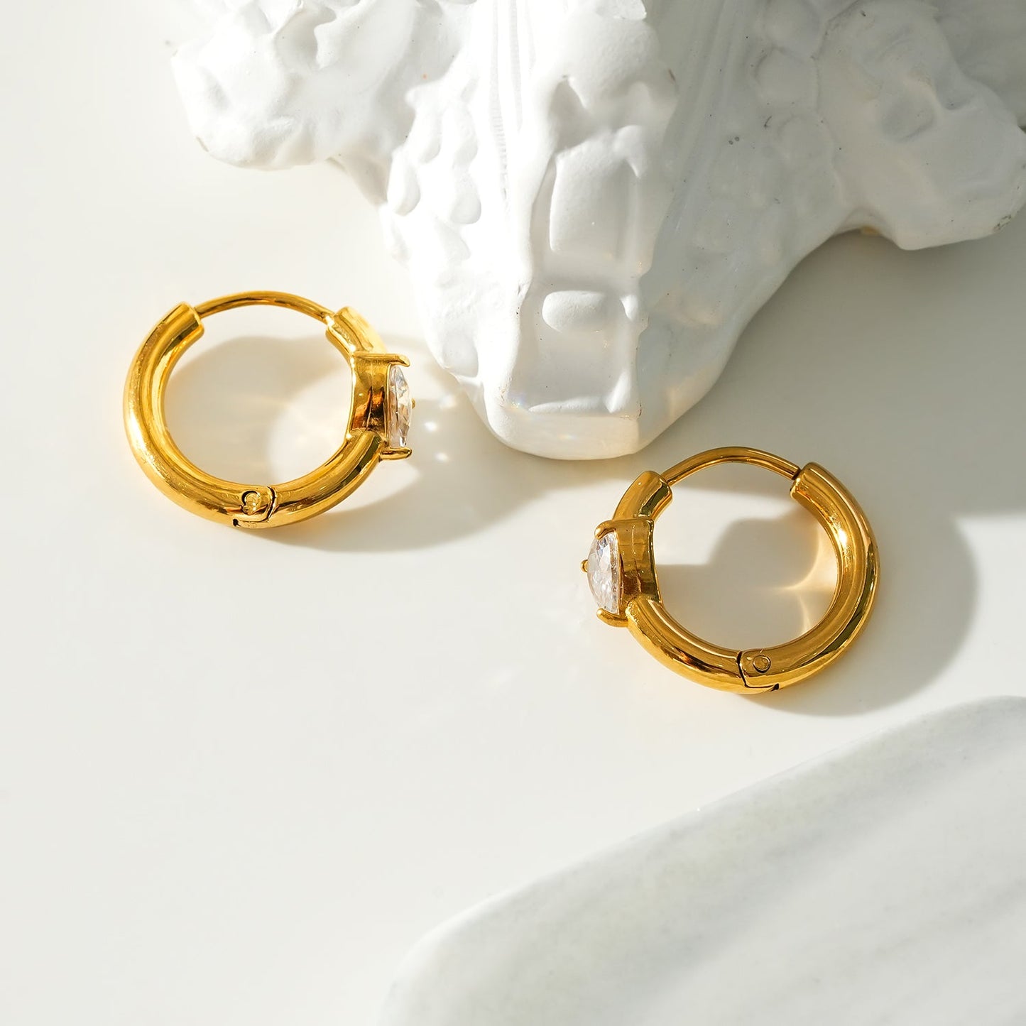 Style PELLE Gold: Mini Hoop Gold Earrings with Heart Shaped Moissanite