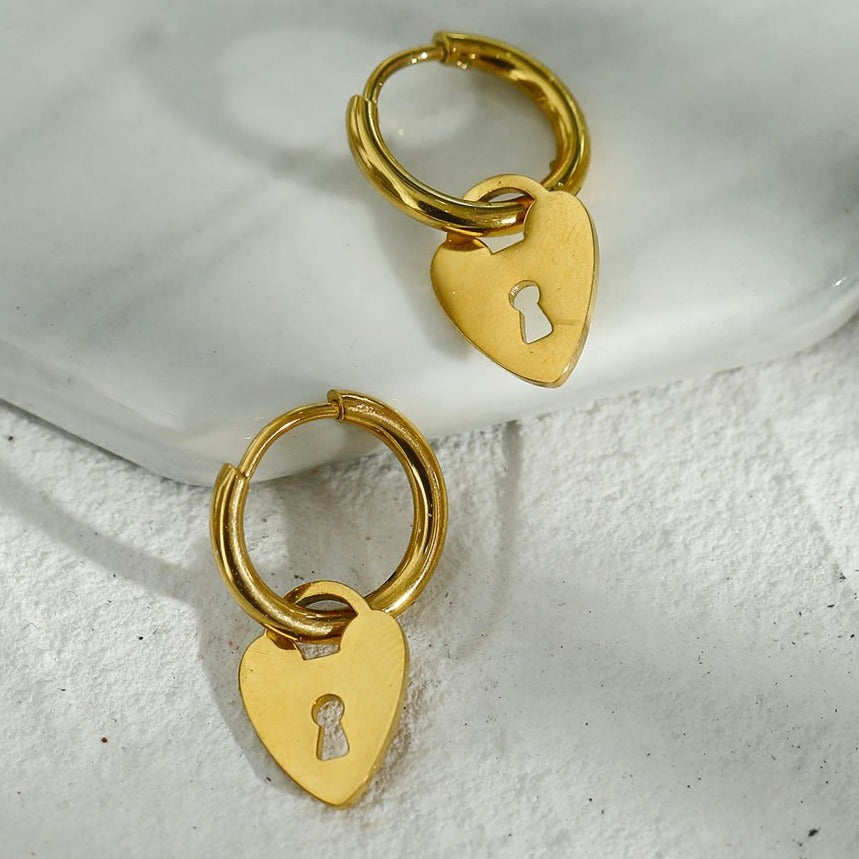 PYAR Gold: Mini Hoop Earrings Anchoring a Heart Shaped Keylock Charm