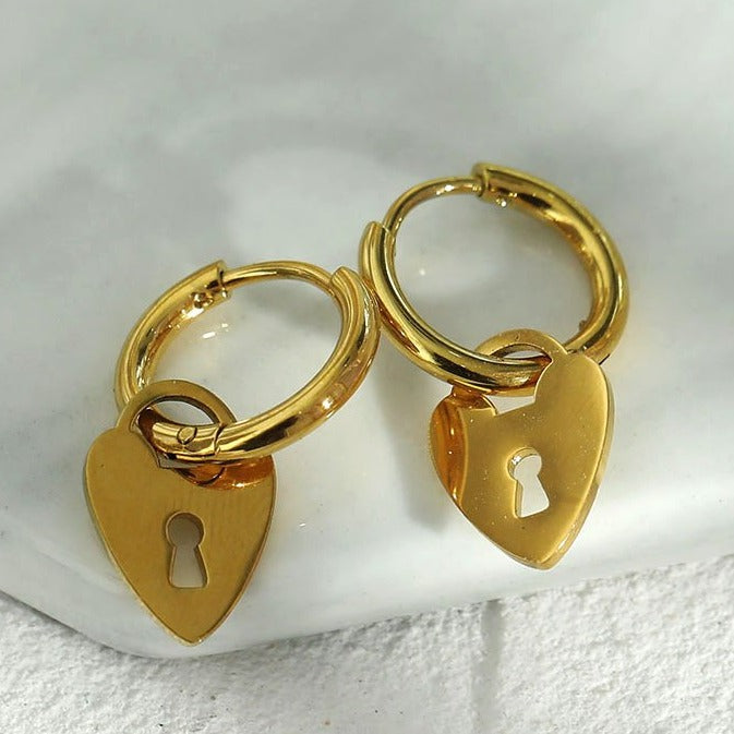 PYAR Gold: Mini Hoop Earrings Anchoring a Heart Shaped Keylock Charm