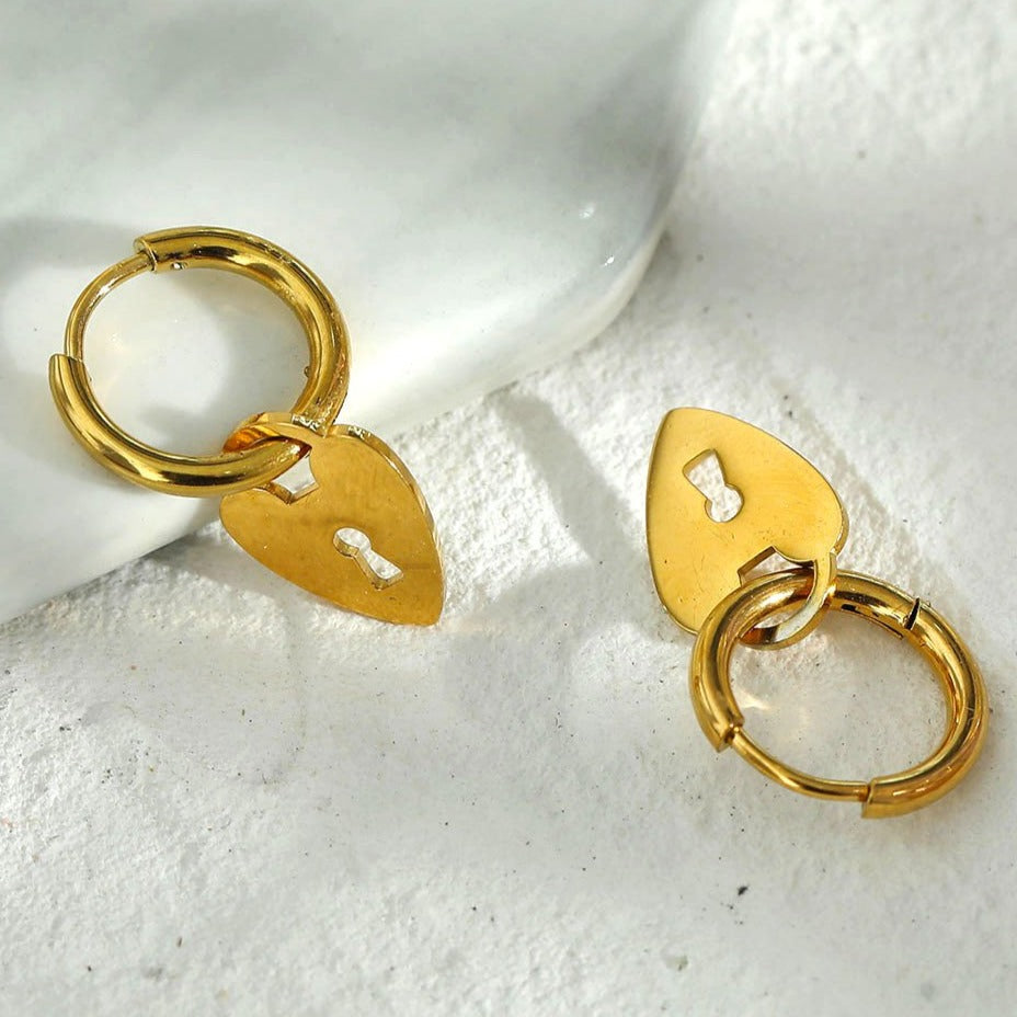 PYAR Gold: Mini Hoop Earrings Anchoring a Heart Shaped Keylock Charm